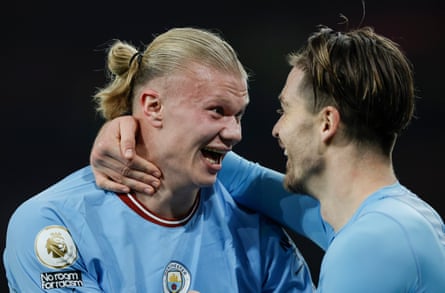 Erling Haaland celebrates with Jack Grealish after City beat Arsenal at the Emirates in February.