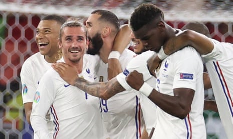 France’s Karim Benzema celebrates scoring their second goal with Antoine Griezmann, Paul Pogba and teammates.