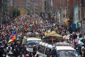 Thousands of people join the procession as it winds its way through the streets.