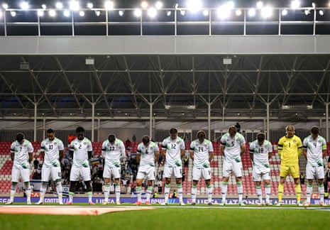 The Republic of Ireland team, wearing black armbands in recognition for all the lives lost in the conflict in Gaza, bow their heads during the Israeli national anthem.