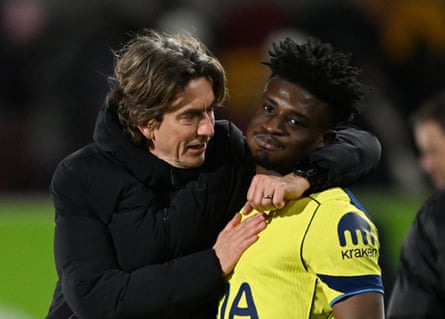 Thomas Frank embraces Mohammed Kudus after the final whistle