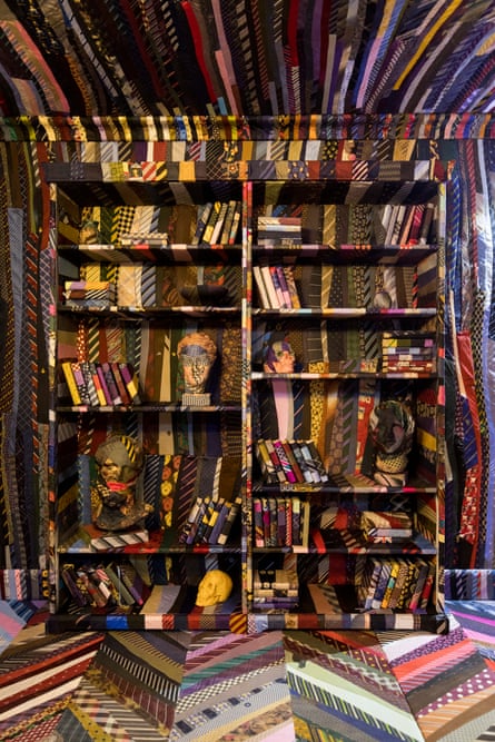 A bookcase of ties.
