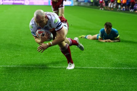 Liam Marshall dives in to score a try