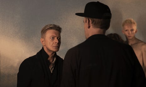 David Bowie talking to the music director Johan Renck on the set for the music video Blackstar.