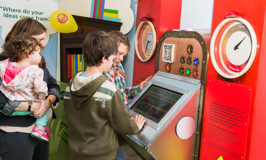 Children checking the scores on the Sparkometer, an interactive machine at the museum.