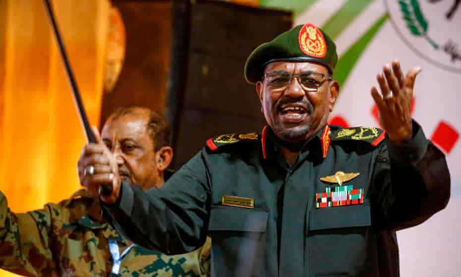 Omar al-Bashir addresses a paramilitary group in Khartoum, February 2019