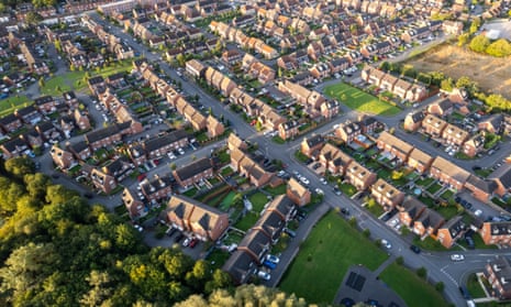 Top down aerial view of houses and streets in a residential area in the UK