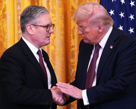 Keir Starmer and Donald Trump shake hands in the East Room