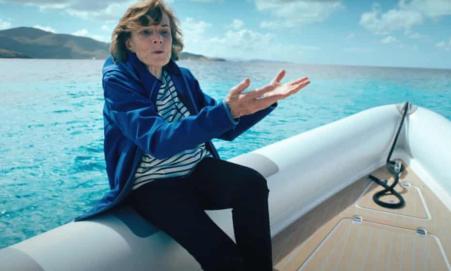 Sylvia Earle sitting on bow of boat