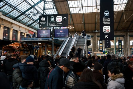 Eurostar suspends its cross-Channel train services to and from London until further notice following a power supply problemPeople gather near directional signs indicating the way to the London departures hall at Gare du Nord station, after Eurostar announced a power supply problem in the Channel Tunnel that links Britain and France, in Paris, France, December 30, 2025. REUTERS/Stephanie Lecocq