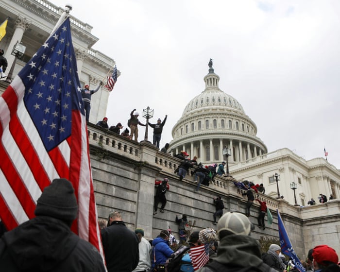 Judge grants DoJ bid to dismiss January 6 cases against rightwing Oath Keepers — image supplied by The Guardian US's feed