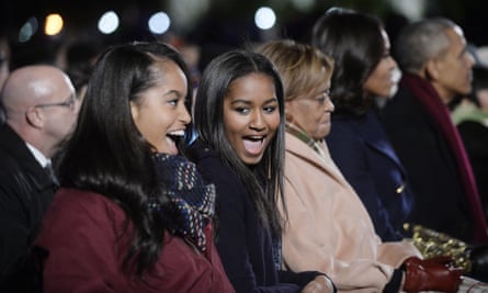 Michelle Obama and President Barack Obama attend the national Christmas tree lighting ceremony