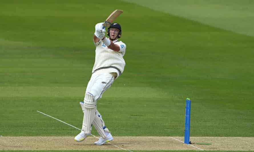 New Zealand batsman Kyle Jamieson hits out only to be caught by Matthew Potts off the bowling of Jimmy Anderson.