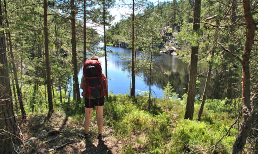 backpacker by one of the many lakes on the Dalsland Pilgrim Trail