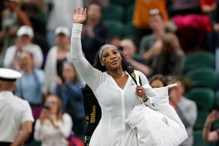 Serena Williams waves to the Centre Court crowd after her first-round defeat by Harmony Tan in 2022