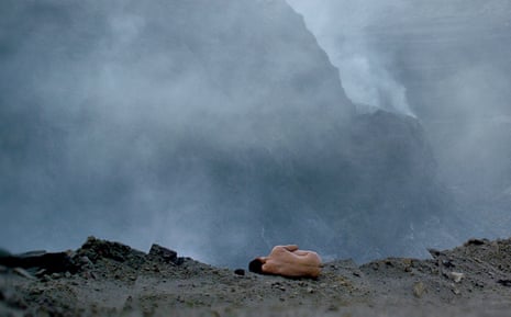 A naked man lies in a quarry in Zhao Liang’s Behemoth, a film that captures the ‘shocking disregard for workers’ living conditions’. 