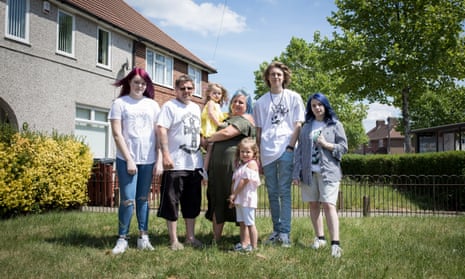 The Rivers family outside their Dagenham home, from left: Ruby, 14, Lee, Harlee-Rose, three, Kelly, Scarlett, five, Martin, 19, and Bethany, 14. 