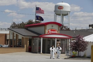 Workers leave a Tyson Foods pork processing plant during the height of the pandemic in 2020.