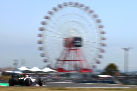 Max Verstappen races past the big wheel at Suzuka on his way to pole position.
