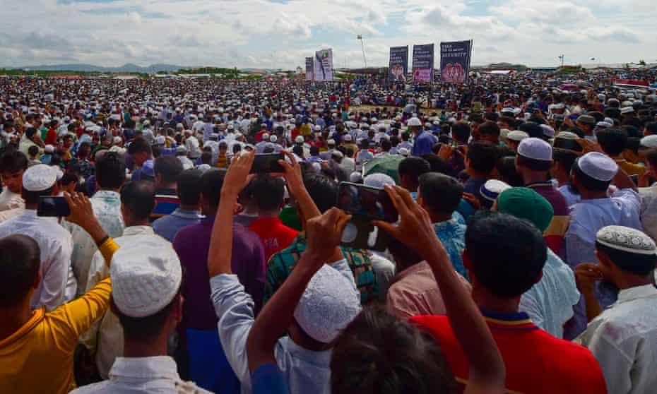 Rohingya refugees attend a ceremony organised to remember the second anniversary of a military crackdown that prompted a massive exodus of people from Myanmar to Bangladesh, at the Kutupalong refugee camp in Ukhia on 25 August 2019.