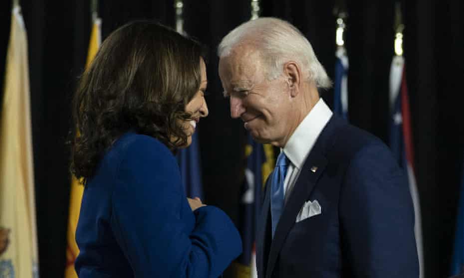 Joe Biden,Kamala Harris<br>Democratic presidential candidate former Vice President Joe Biden and his running mate Sen. Kamala Harris, D-Calif., pass each other as Harris moves to the podium to speak during a campaign event at Alexis Dupont High School in Wilmington, Del., Wednesday, Aug. 12, 2020. (AP Photo/Carolyn Kaster)