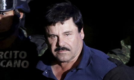 Recaptured drug lord Joaquín ‘El Chapo’ Guzmán is escorted by soldiers in Mexico City on 8 January 2016.