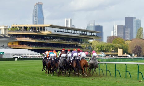 Horses and jockeys during a race in front of the grandstand at Longchamp on Saturday.