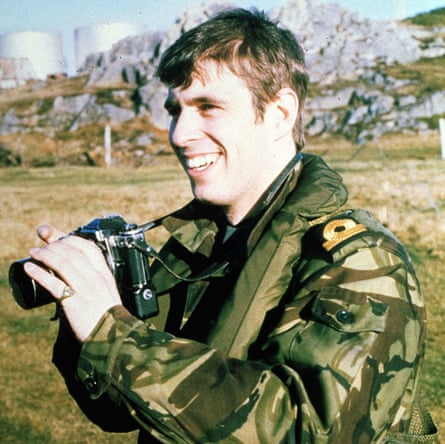 Andrew in camouflage holding a camera