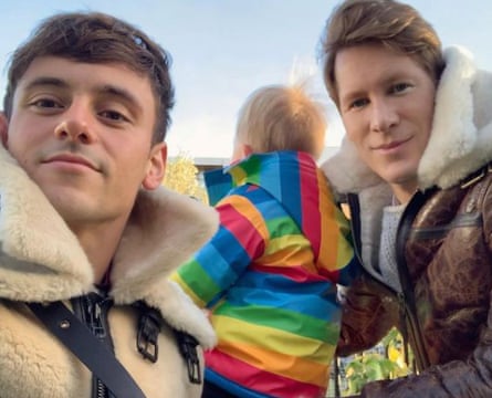 Dustin Lance Black and Tom Daley with their first child.