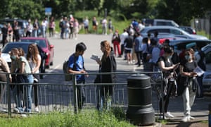 People queuing for the first dose of Pfizer coronavirus vaccine.