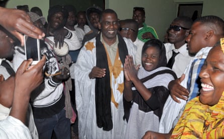 Mauritania anti-slavery activist Biram Ould Dah Ould Abeid is welcomed by supporters as he walks out of jail after the country’s supreme court downgraded the crimes they were convicted of last year and ordered their release, on May 17, 2016 in Nouakchott.