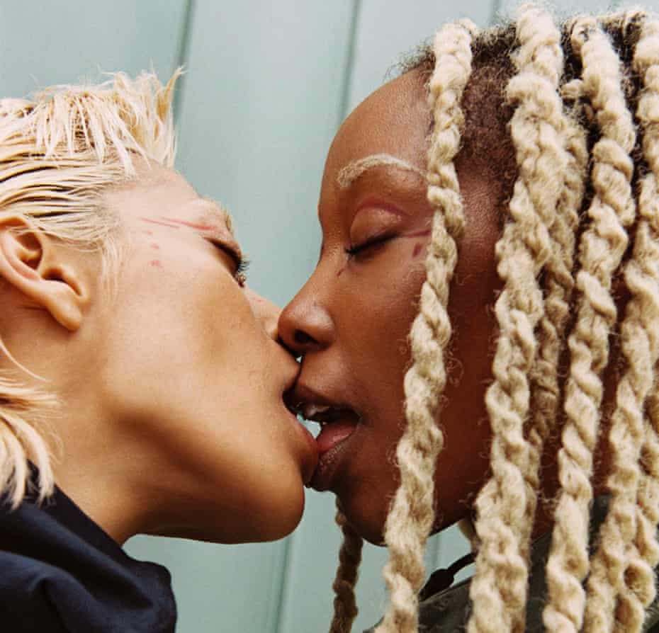 Head shot of couple Calm and Violet (both 23) kissing, May 2021