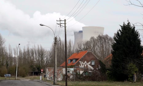 Steam rises from the cooling towers of the Doel nuclear power plant.