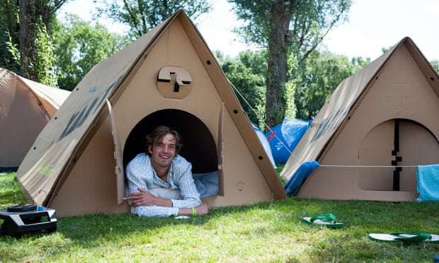 man in a cardboard tent
