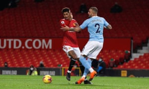 Manchester United’s Marcus Rashford is fouled by Manchester City’s Kyle Walker in the penalty area.