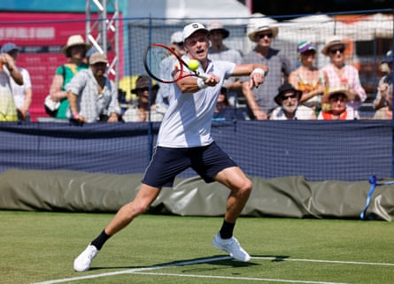 Jenson Brooksby plays a forehand shot against Ugo Humert at Eastbourne.