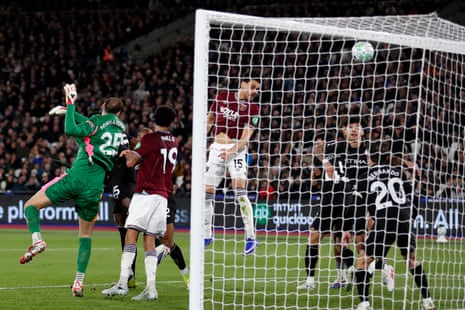 Konstantinos Mavropanos (C) heads home their first goal.