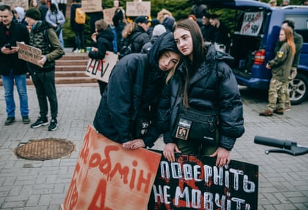 Protesters hold placards calling for the release of captured soldiers