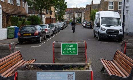 A cyclist approaches a low traffic neighbourhood (LTN) barrier on August 1, 2023 in London, England.