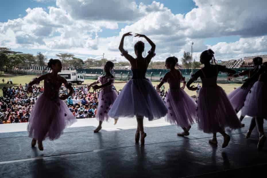 Members of Dance Centre Kenya (DCK) perform during a dress rehearsal of ‘Nutcracker’, a ballet primarily performed during the Christmas period, in front of about 1000 children invited from Kibera slum in Nairobi, on November 28, 2021