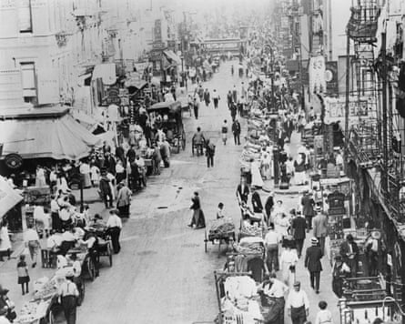 bustling city street in black and white photo