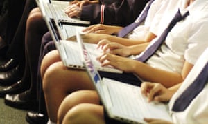 Students work on computers