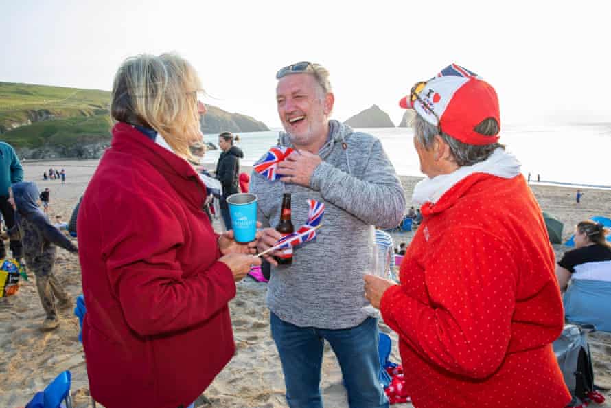 Sally Main, Jim Main and Averil Billing at a beach party at Holywell Bay in Cornwall, hosted by the local Surf Lifesaving Club.