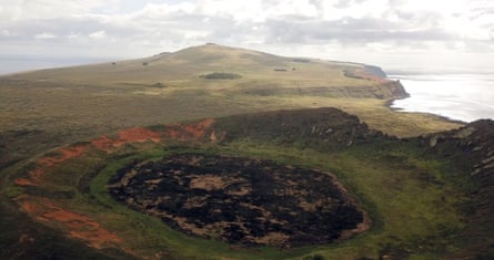 The location of the new Moai statue in a volcano’s crater lake, which had dried up in recent years, exposing the figure entombed for centuries by the mud