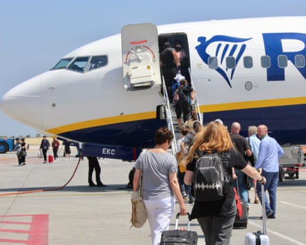 Passengers boarding a Ryanair flight