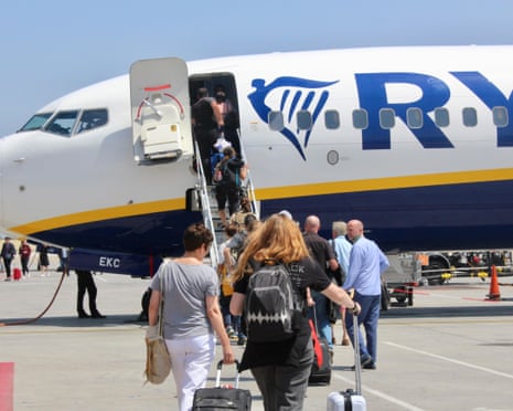Passengers boarding a Ryanair flight