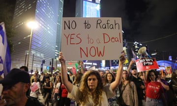 Protesters block the Ayalon highway where they call for the immediate release of Israeli hostages held by Hamas in Gaza, during a protest in Tel Aviv.