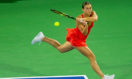 Marta Kostyuk of Ukraine competes with Ipek Oz (not seen) of Turkiye during women's single first round match of Dubai Duty Free Tennis Championship in Dubai, United Arab Emirates on February 19, 2023.