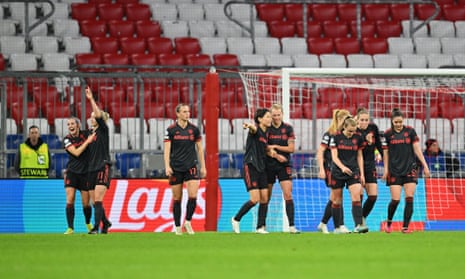 Lea Schüller celebrates with teammates after putting Bayern in front with a fine header.