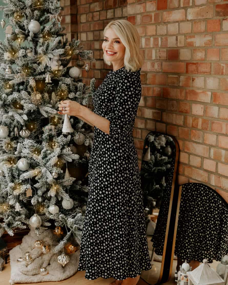Holly Willoughby in a star print dress from M&S’s Christmas collection.